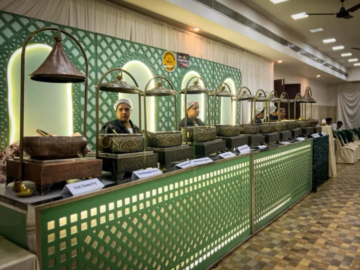 Live buffet served from copper pots — Shadhi Catering and Event Management